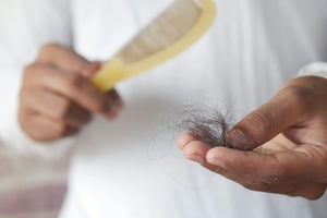 What is normal hair fall in adults?